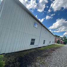 Commercial-Pressure-Washing-Metal-Siding-Cleaning-for-Shops-Turbo-Cleaning 1